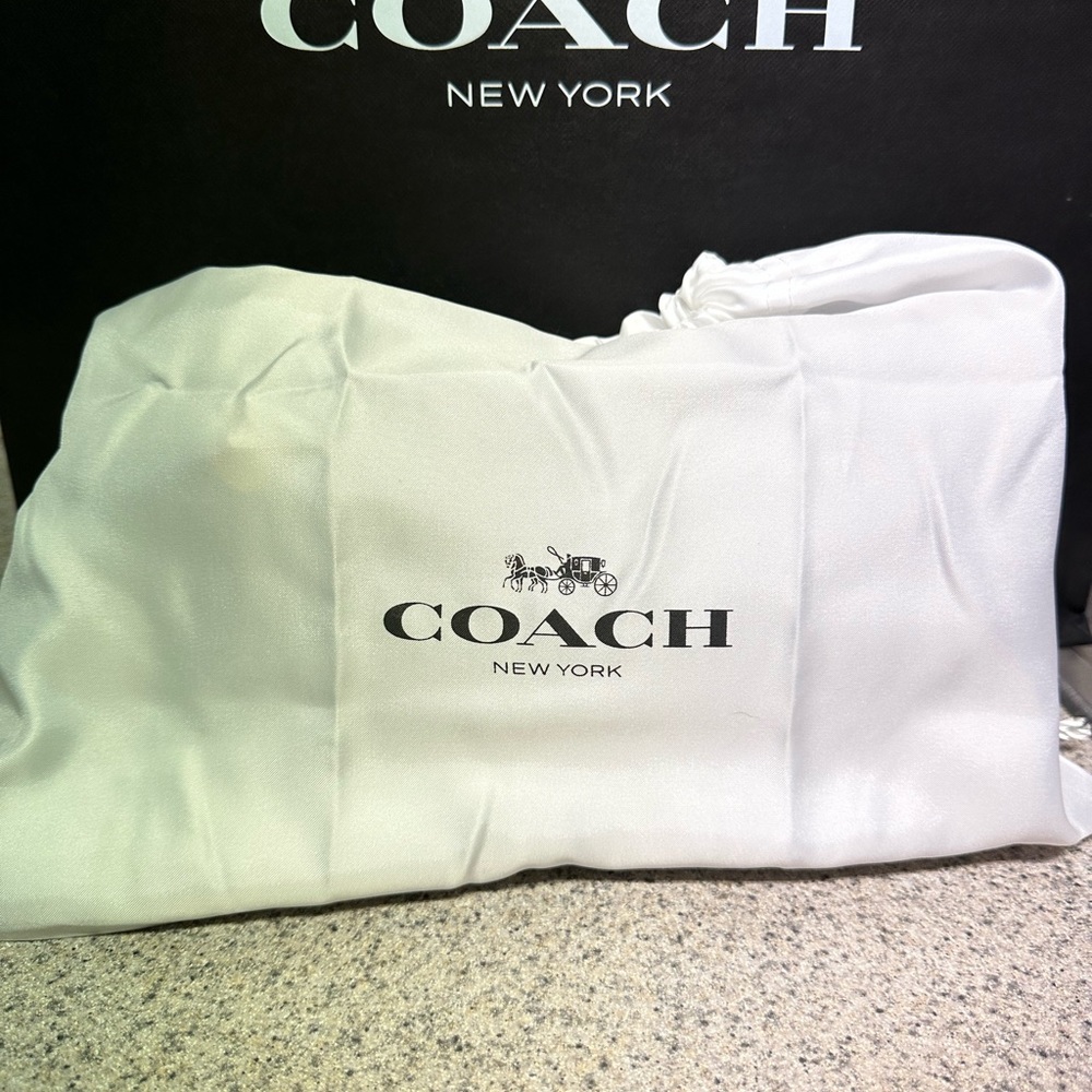 Coach swinger bag wine color
